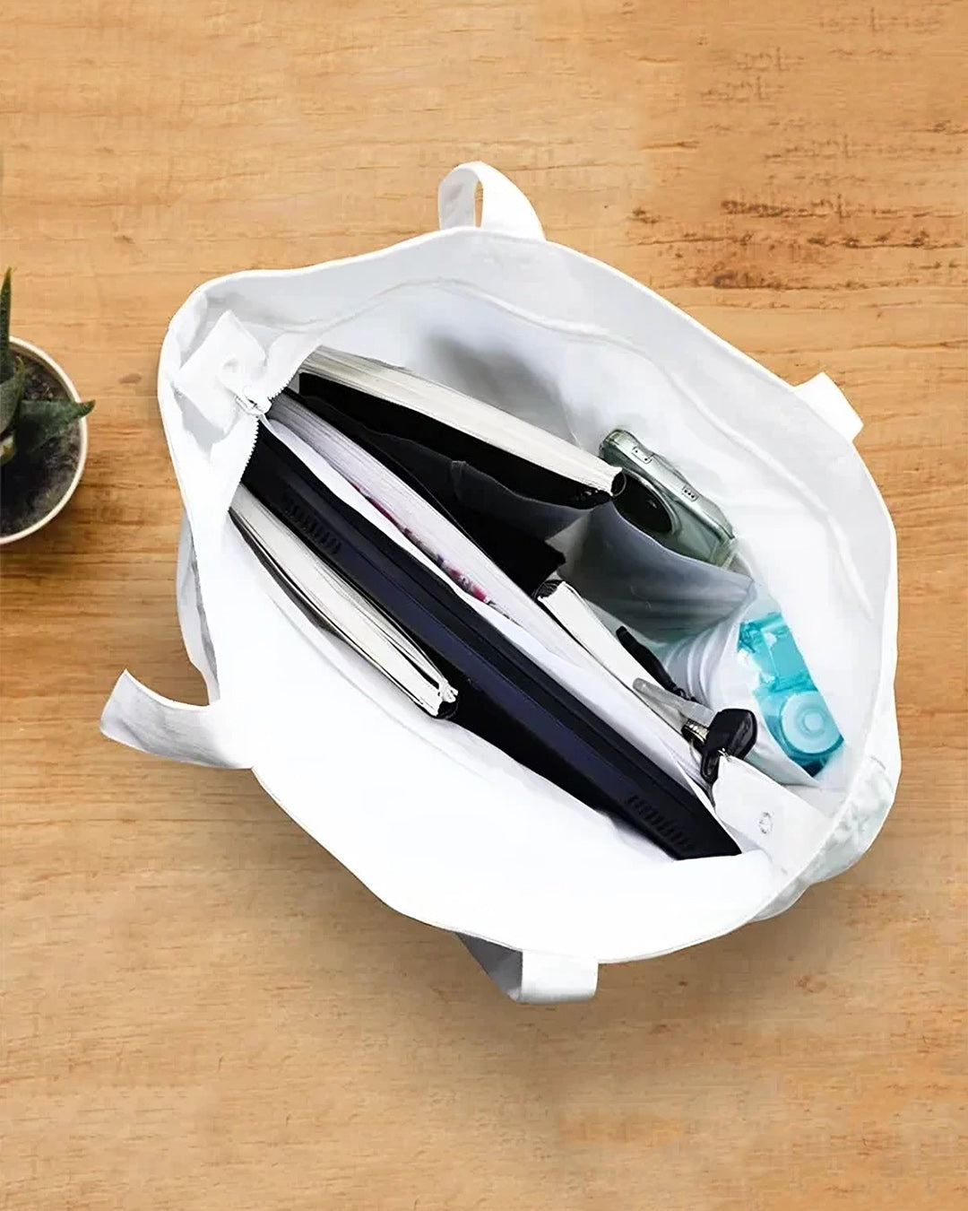 Large tote bag interior showing dual compartments and water bottle holder - cotton art bag organization