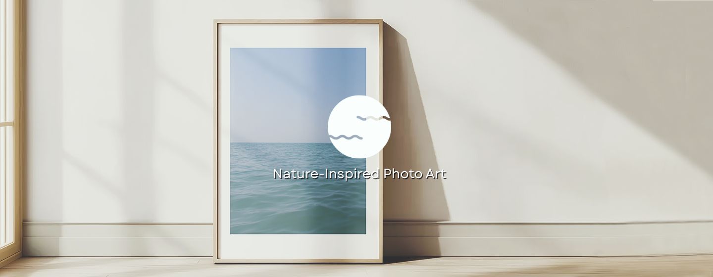Framed photograph of a beach with a blue sky and ocean.