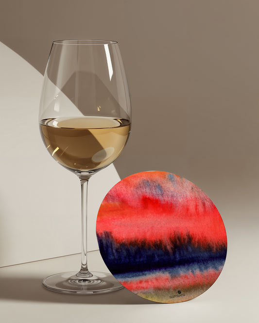 Abstract nature watercolor coasters displayed on wooden table with coffee cup - artistic home accessories