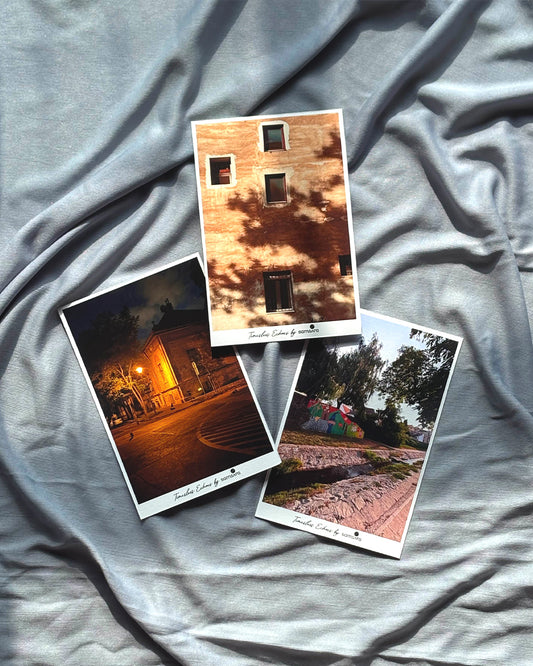 A set of three 5x7 inch photo art prints displayed on a textured surface, featuring images with architectural elements and warm tones.